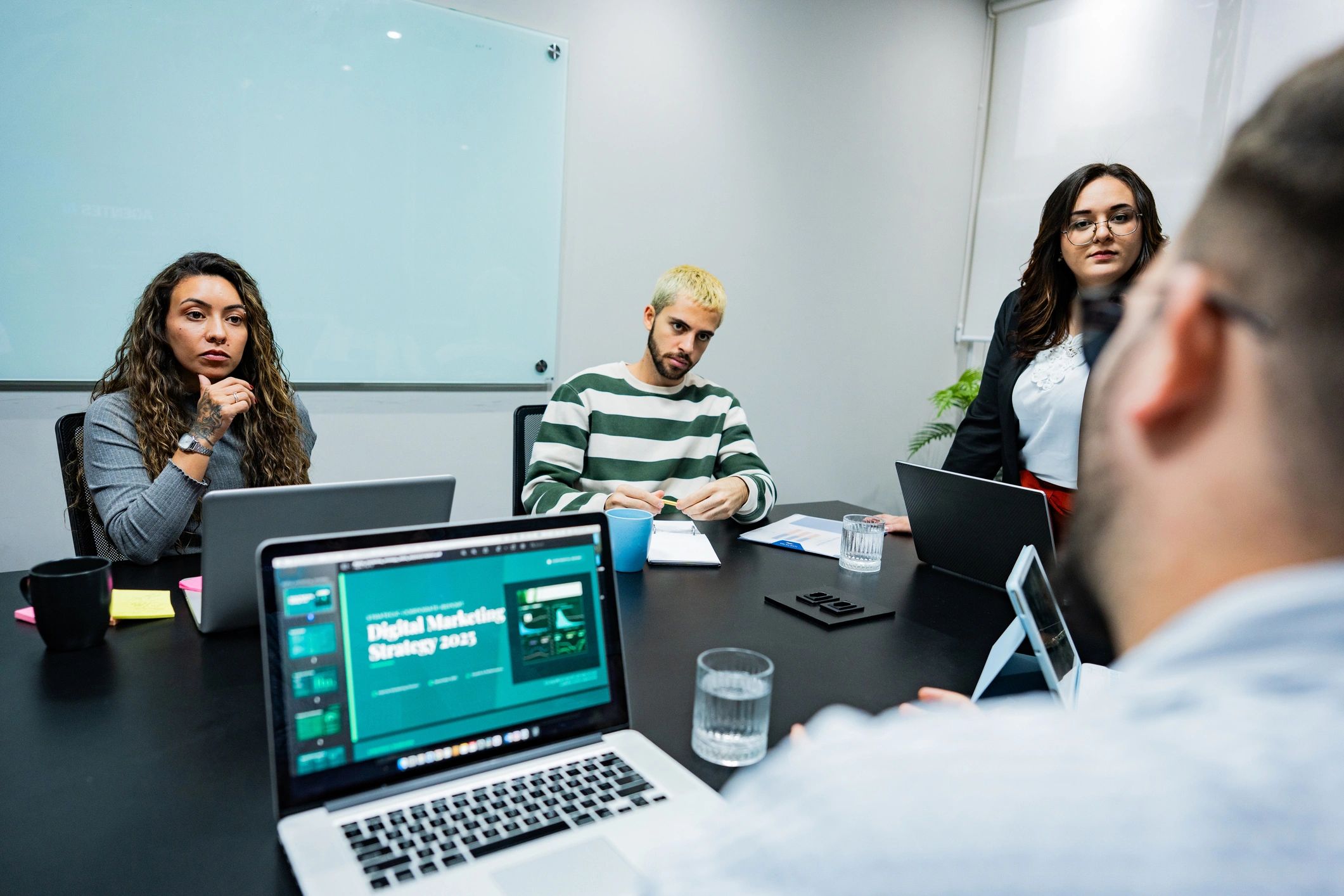 Team meeting and collaborating in a modern office